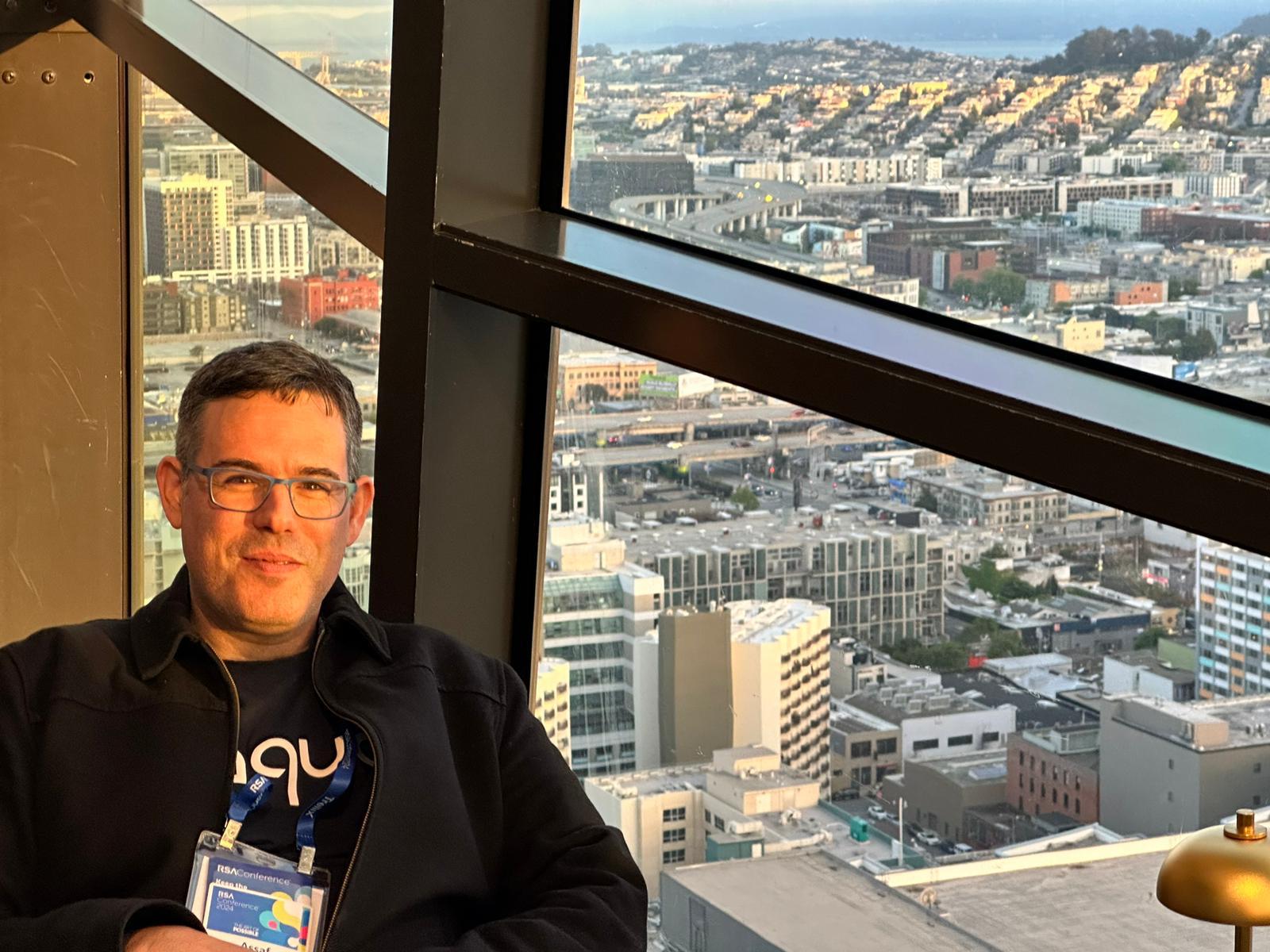 Assaf Morag at RSA Conference in San Francisco, with the city view behind him